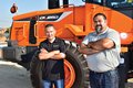 Adolfo Sandoval (left) and Art De La Torre, salesman from Scott Equipment (right)